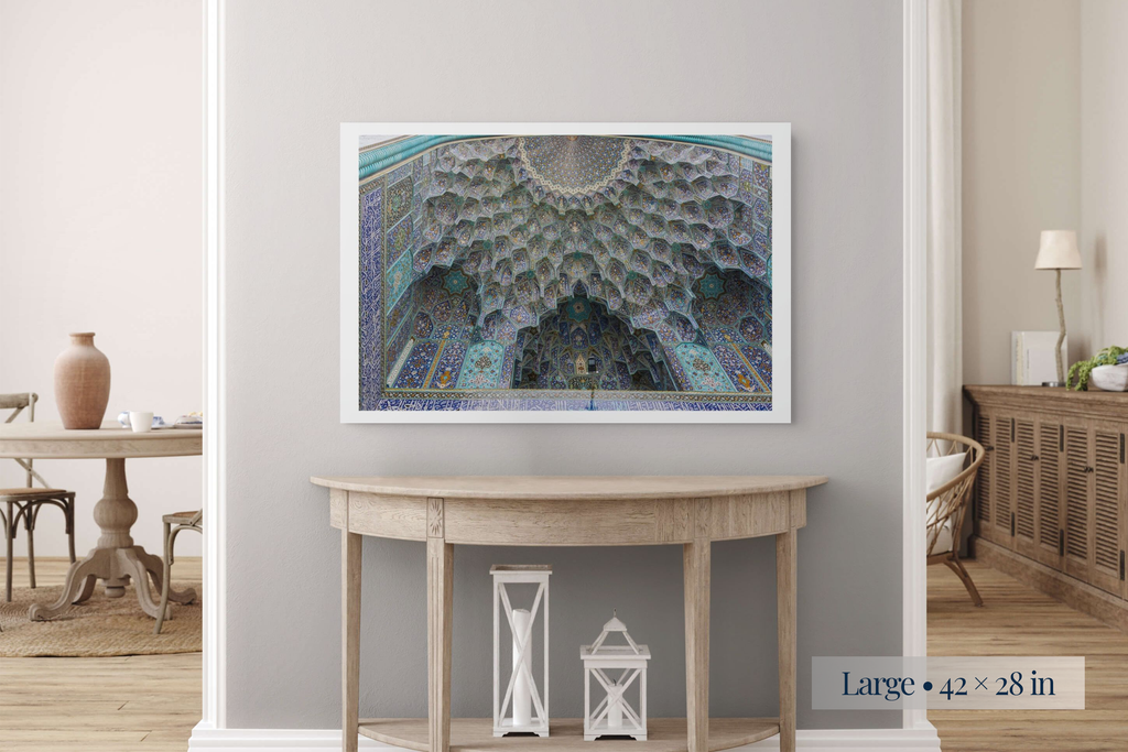 Large: The Celestial World shown as a Large 42 × 28-inch print above a console table.