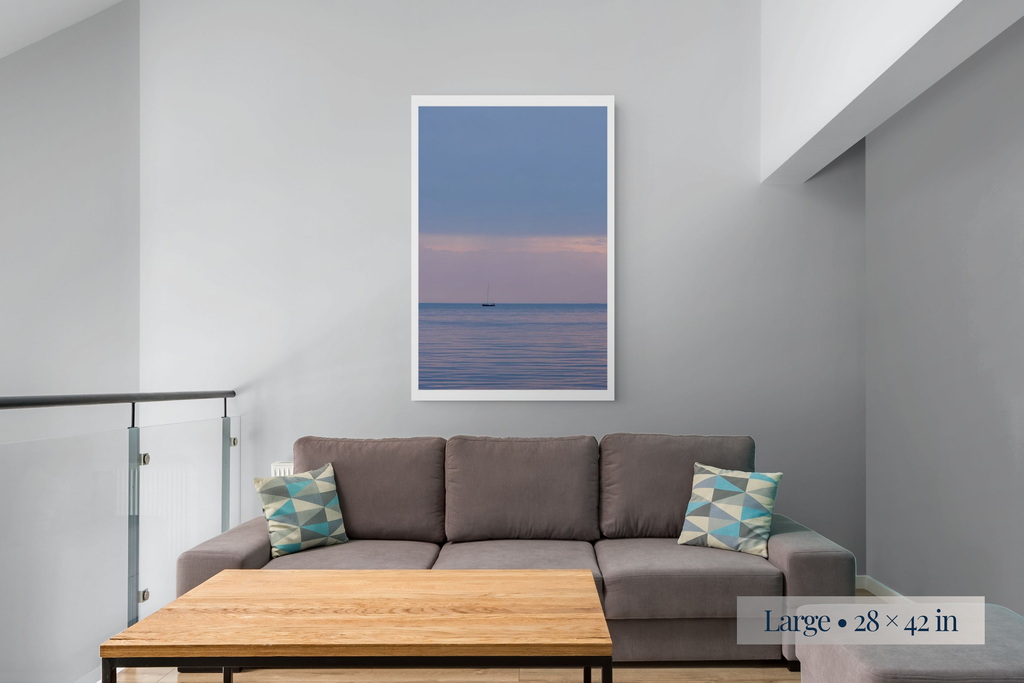 Large: Where Stillness Begins shown as a Large 28 × 42-inch print above a sofa.